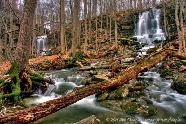 A wide angle showing 2 of the 3 waterfalls in Three Falls Woods Nature Preserve