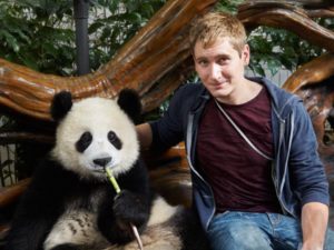 Matthew Conheady with a panda