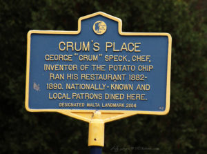 a blue and yellow historic marker about potato chips