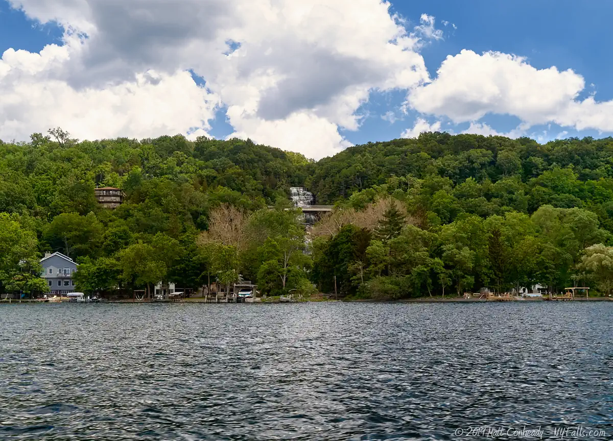 A wide shot of Hector Falls from the other side of Seneca Lake