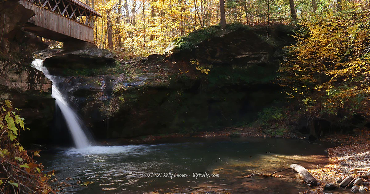 Artist Falls and a covered bridge in autumn