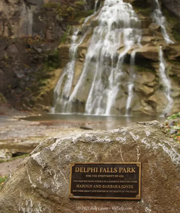 A plaque dedicated to Harold Jones in front of Delphi Falls