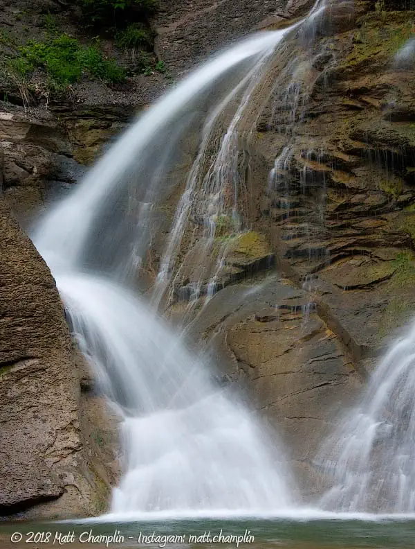 A closeup of a waterfall that bounces from side to side in Rattlesnake Gulf.
