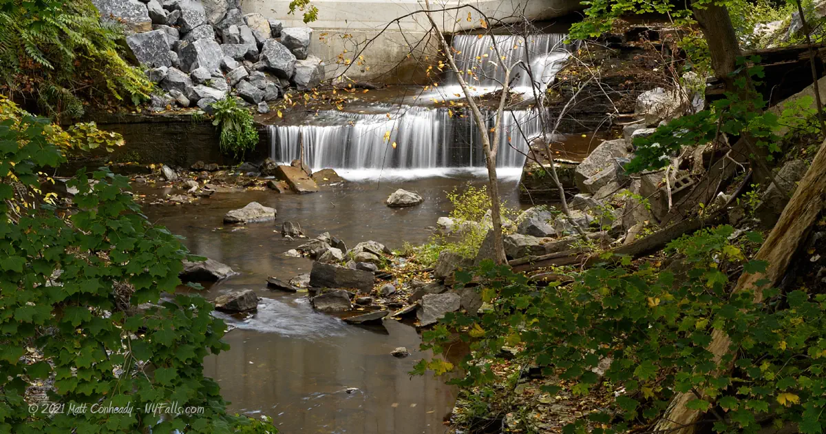A view of a small waterfall under the Willow St culvert in Burdett, NY