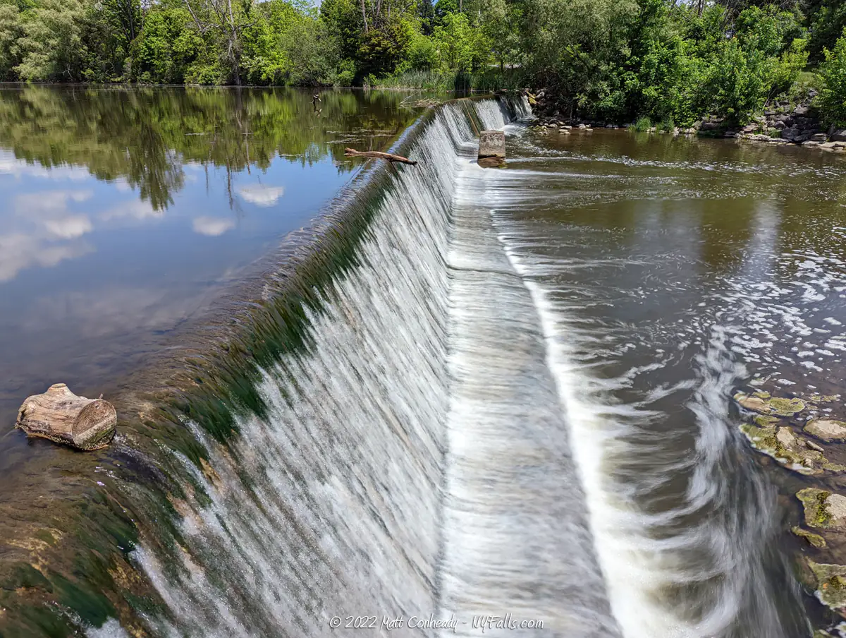 A view down the length of Churchville Dam from the side.