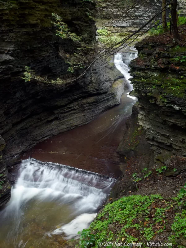 A view of a narrow and inaccessible portion of Deckertown Falls gorge with some small waterfalls.