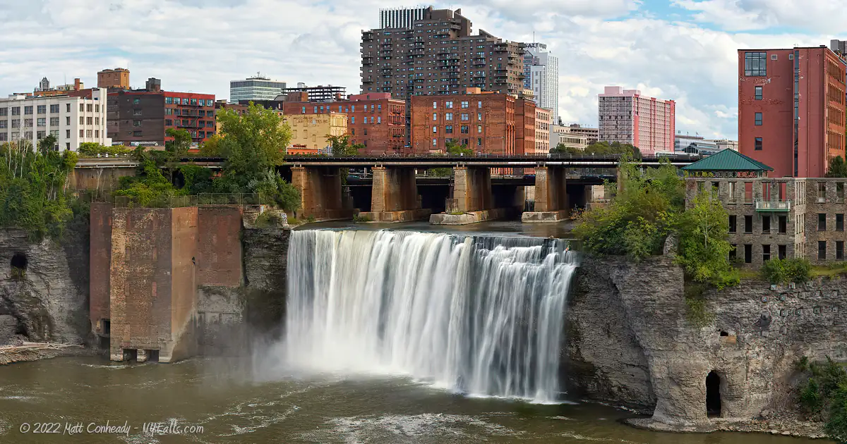 A view of Downtown Rochester and High Falls with railroad bridge.