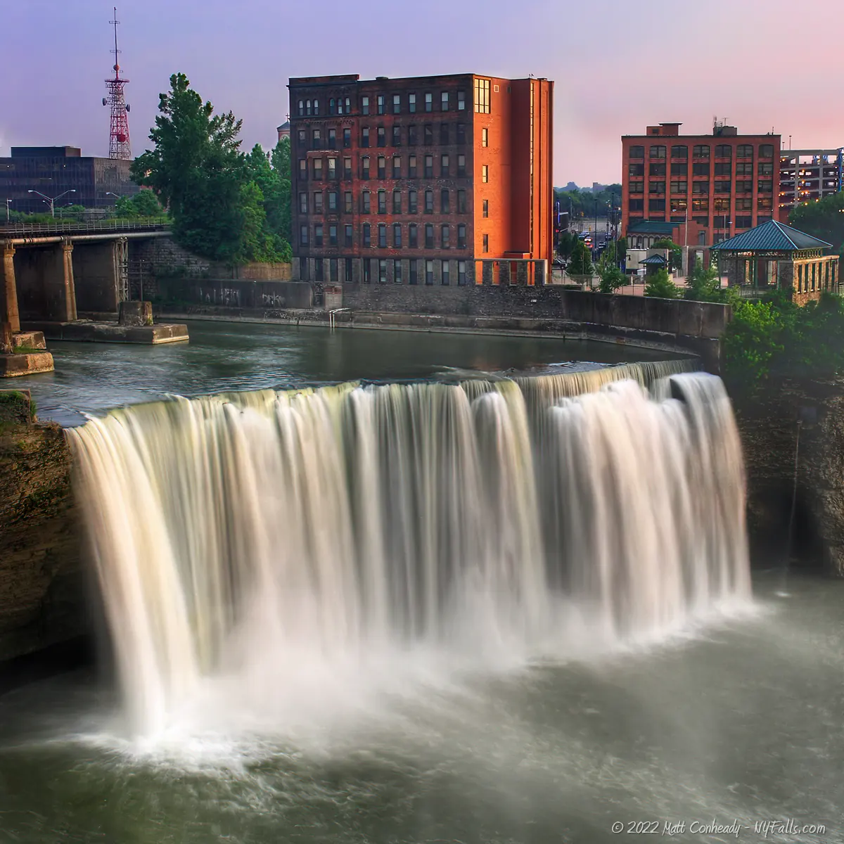High Falls at Dusk seen from the brewery side of the gorge. Next to the Falls is the Gorsline Building