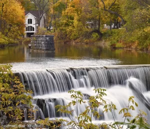 A view looking over Honeoye Falls to the mill pond above it.