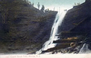 A vintage postcard showing "Crystal Brook Falls" AKA Warsaw Falls