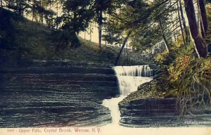 A vintage postcard showing "Upper Falls, Crystal Brook" in Warsaw, NY