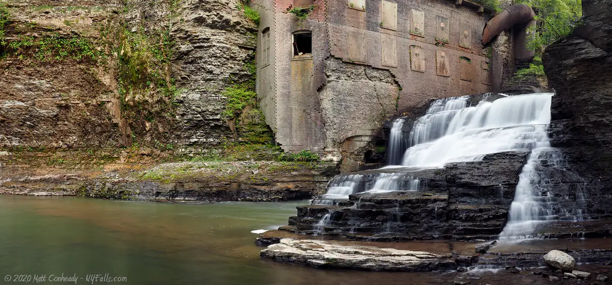 Wells Falls, photographed from below, with the old Van Netta water plant visible behind it.