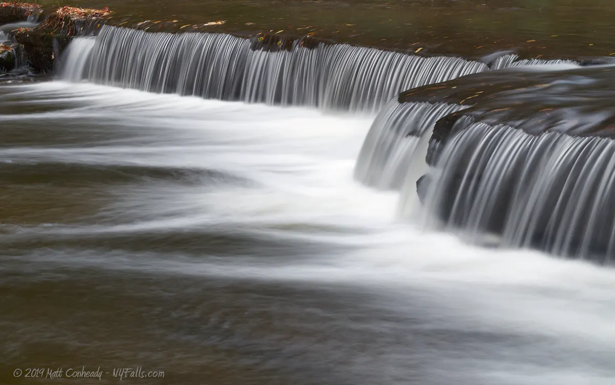 A small and smooth waterfall upstream from the main falls at Chittenango Falls State Park