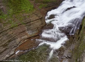A view looking down at the twisting bottom of Lucifer Falls