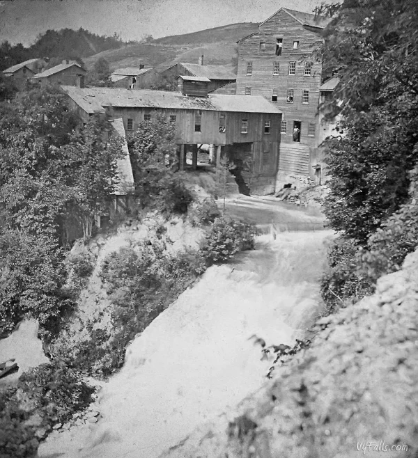 Gibsonville papermill and waterfall circa 1872 as seen from the gorge edge where the present day trail exists.