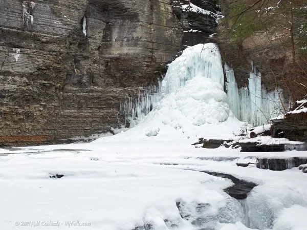 A frozen Eagle Cliff Falls seen on a winter hike up Havana Glen