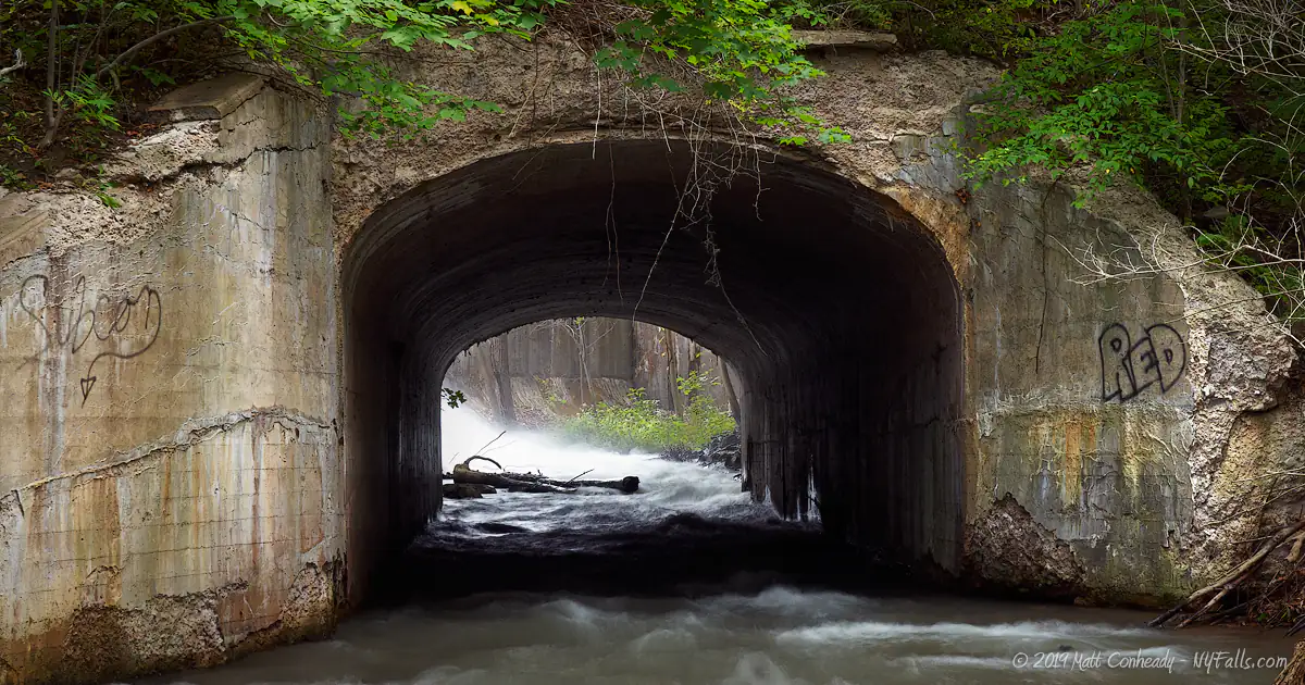 A tunnel west of Holley Canal Falls that carries the East Branch of Sandy Creek under the Erie Canal.
