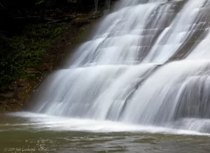 A closeup of a large steep cascade in Stony Brook State Park.