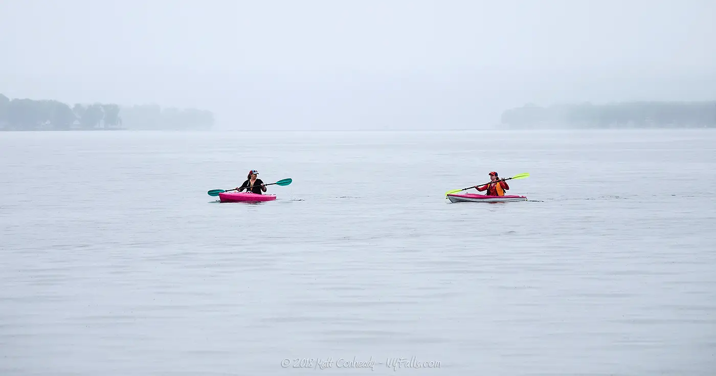 Kayakers on Conesus Lake during heavy fog