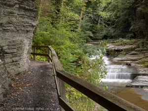 The beginning of the trail into Havana Glen Gorge passing a small waterfall on the right.