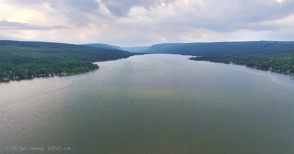 A aerial view of Honeoye Lake on a cloudy day.