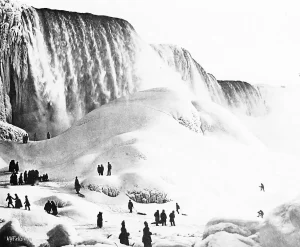 Tourists explore an ice bright below Niagara Falls