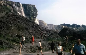 A photo from 1969 showing tourists at the base of American Falls, when it was dewatered.