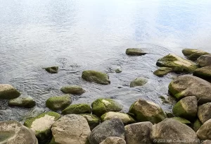Lake Ontario and stones that form the breakwaters at Hamlin