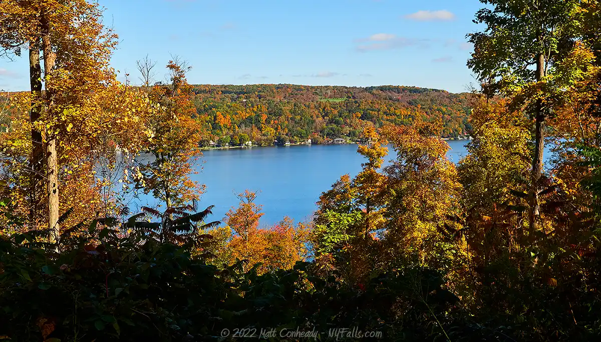 A view of Otisco Lake in autumn, looking east to west from Otisco Lake Preserve.