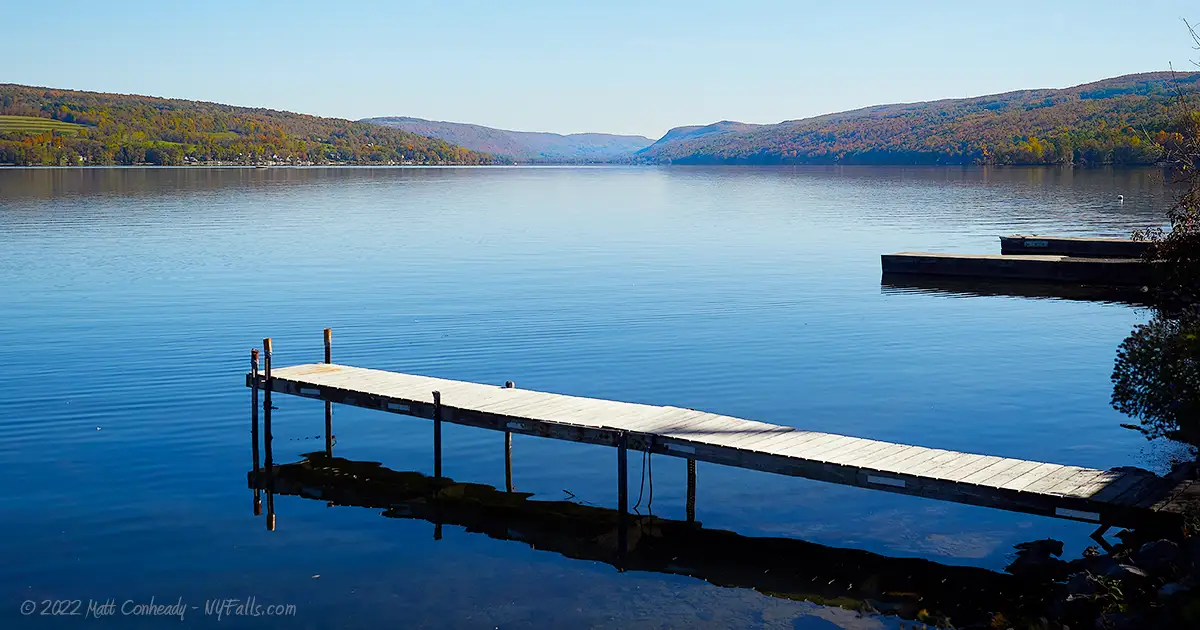 Otisco Lake, looking south from the northwest side of the lake. Private docks are in the foreground.