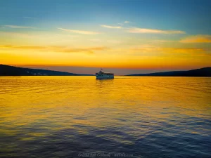 The Seneca Legacy dinner tour boat on Seneca Lake at sunset.