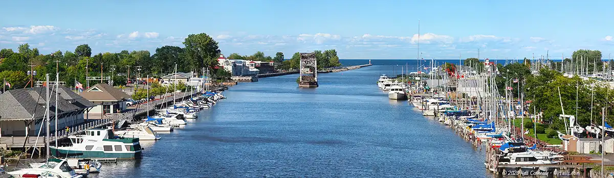 A view of the Genesee river with marinas and Lake Ontario