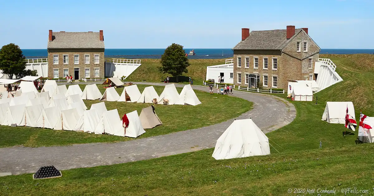 Encampment at Fort Ontario in Oswego, with Lake Ontario in the background.