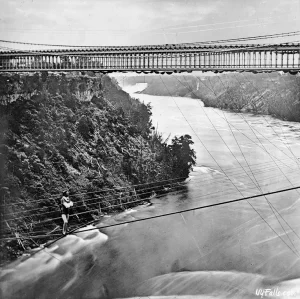 Harry Leslie tightrope walks over the Niagara gorge at the Whirlpool Rapids.