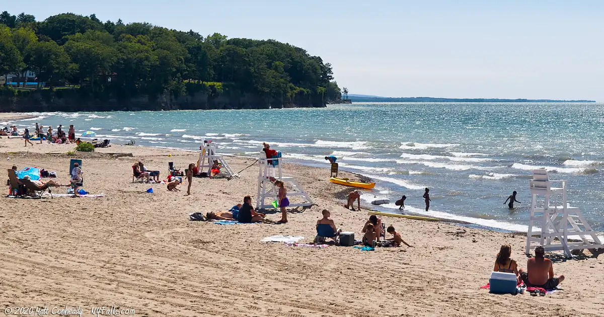 People enjoying a hot summer day at Lake Erie Beach Park