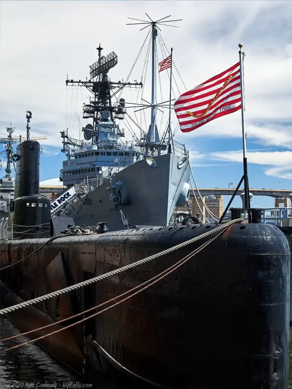 A view of the USS croaker with the USS Little Rock behind it.