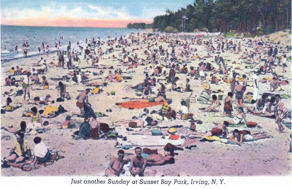 A historic image of a crowded beach at Sunset Bay in Hanover