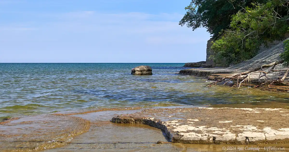 Flat limestone rocks and shale cliffs on the north end of the beach at Wright Park (Lake Erie) in Dunkirk, NY