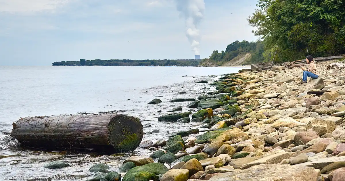 The beach at Lakeside Park with Nine Mile Point Nuclear Station in the background