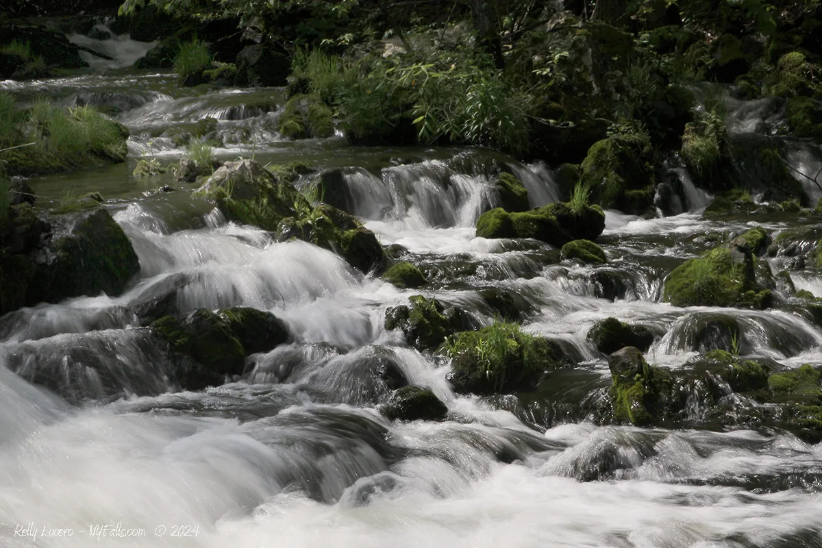 Mossy rocks and rapids upstream from Zabriskie's waterfall.