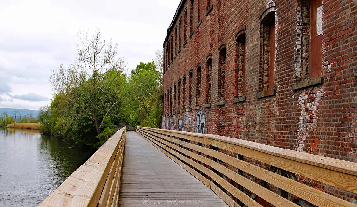 The wooden boardwalk that takes visitors along Fishkill Creek and what remains of an old hat factory.