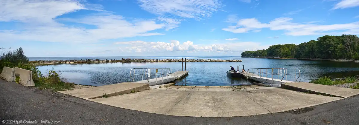 Panoramic view of the boat launch at Sunset Bay Park in Scriba, with Lake Ontario in the background.