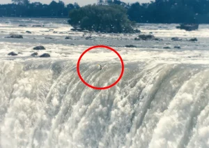 Jesse Sharp going over Niagara Falls in a Kayak